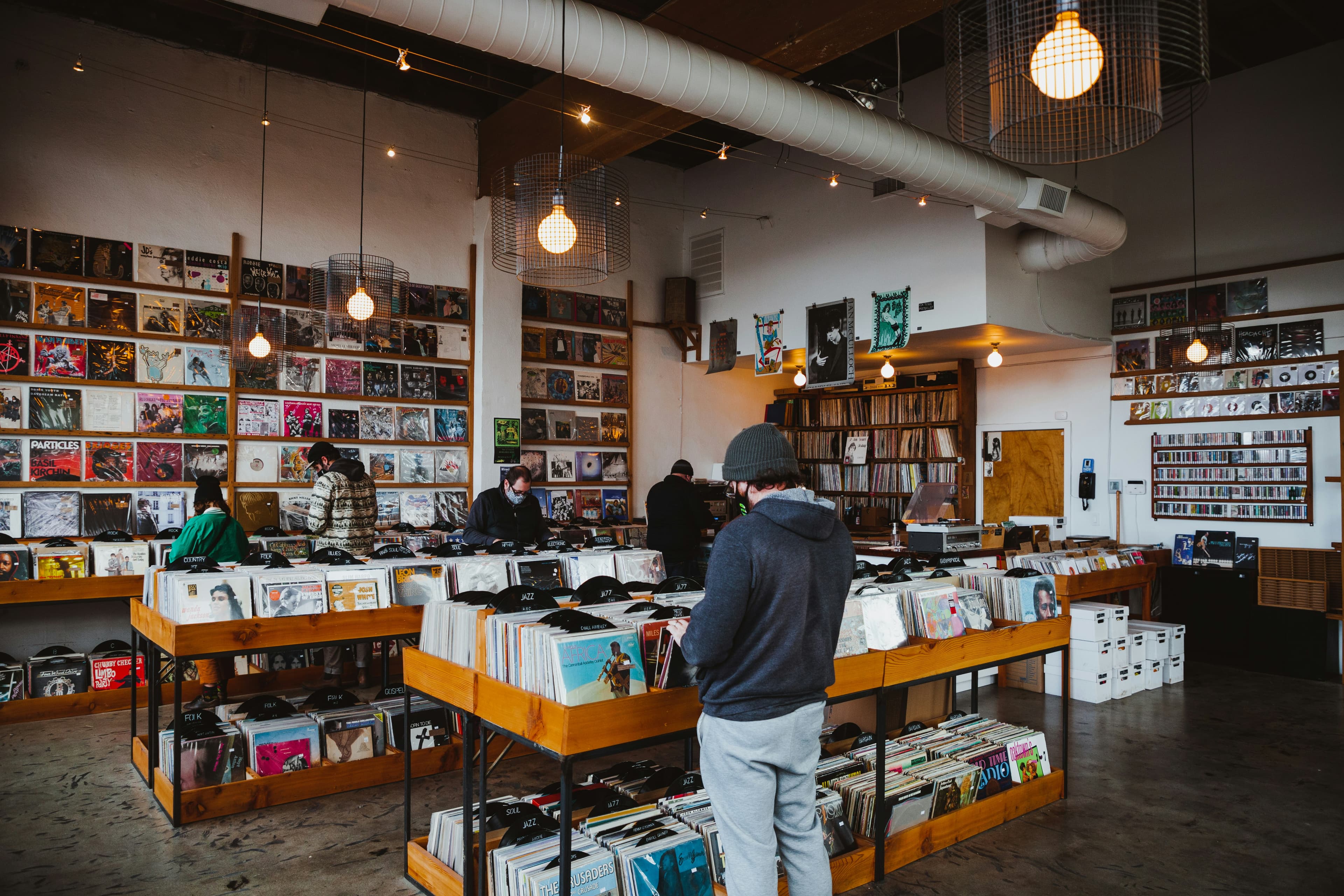 Flipping through the crates at a record store, the best place to start a collection.