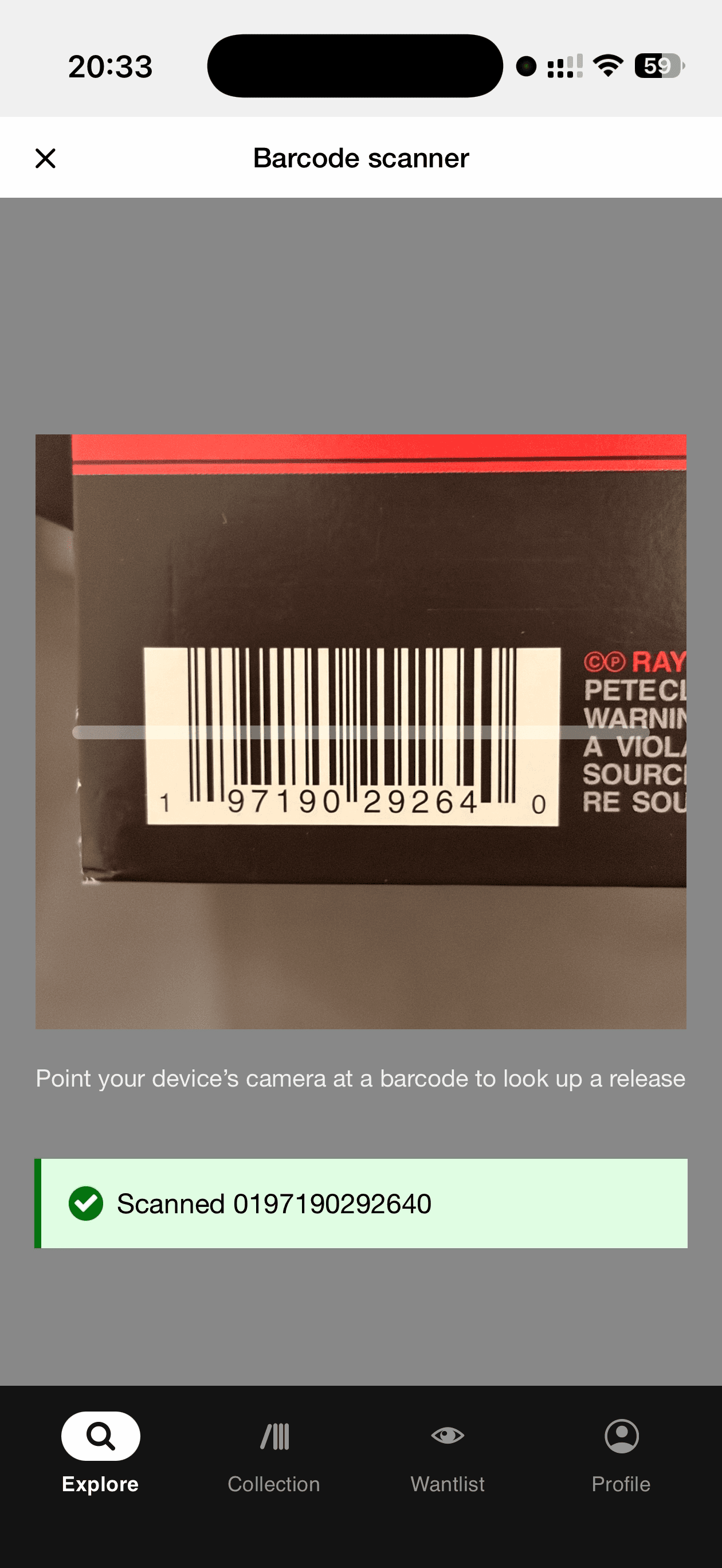 The Discogs mobile app's barcode scanner, aimed at a record sleeve to pull up its database entry.